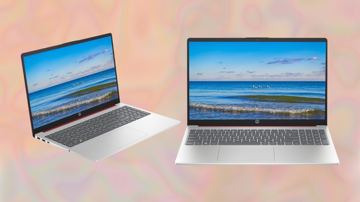 Two HP 15.6" laptops with slim bezels and full-size keyboards are displayed against a soft pastel background, both showing an ocean view on their screens.