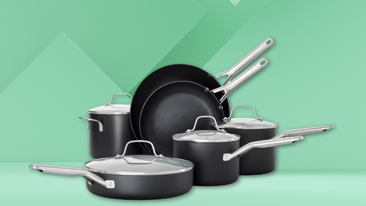Black hard-anodized nonstick cookware set with stainless steel handles and glass lids.