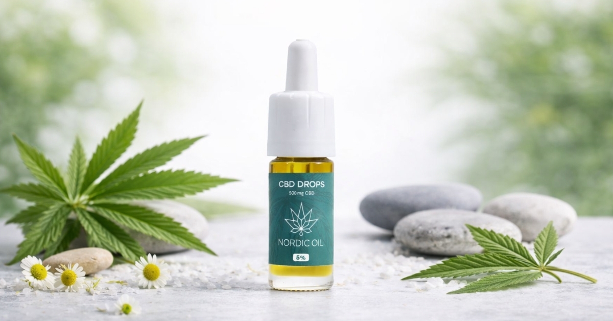 “Nordic Oil CBD drops 500mg bottle displayed with hemp leaves and spa stones”
