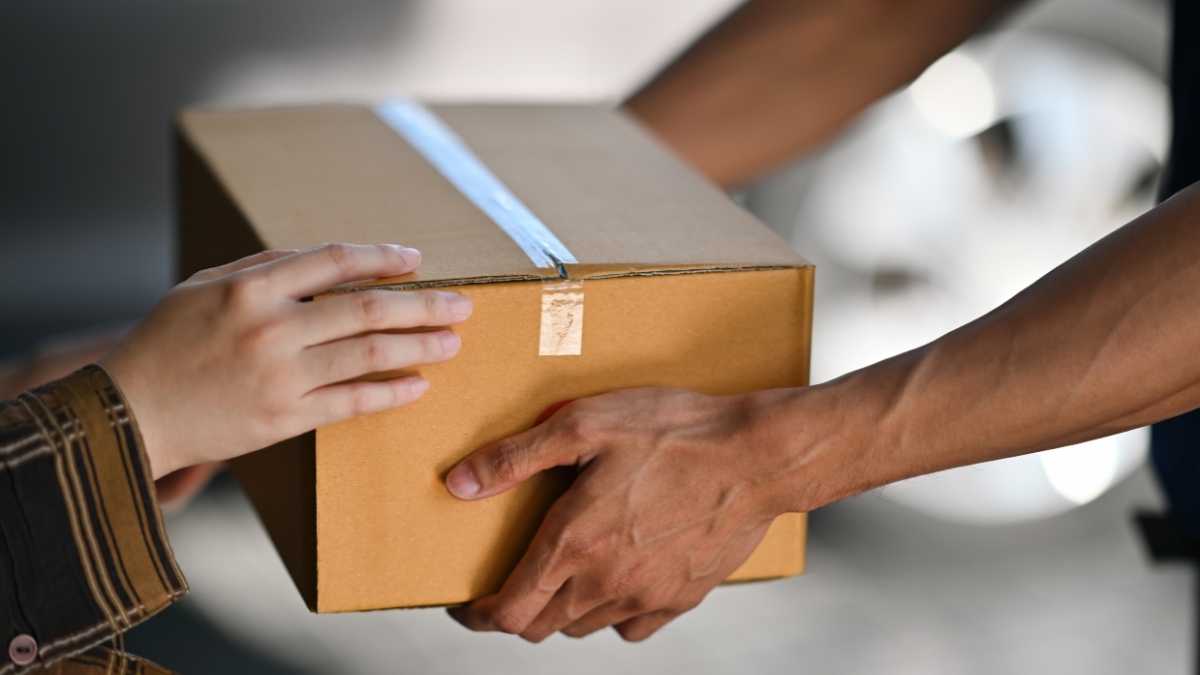 MedExpress Discreet Home Delivery package handed over in plain unbranded box