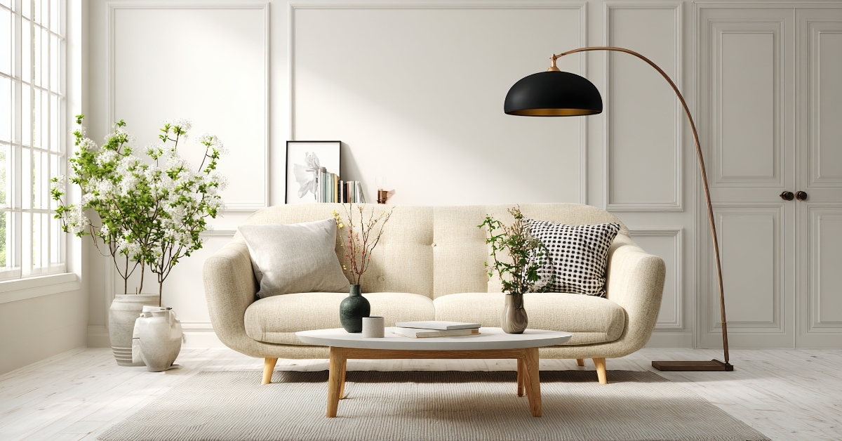 Bruno Wickart designer sofa in neutral fabric styled in a modern European living room