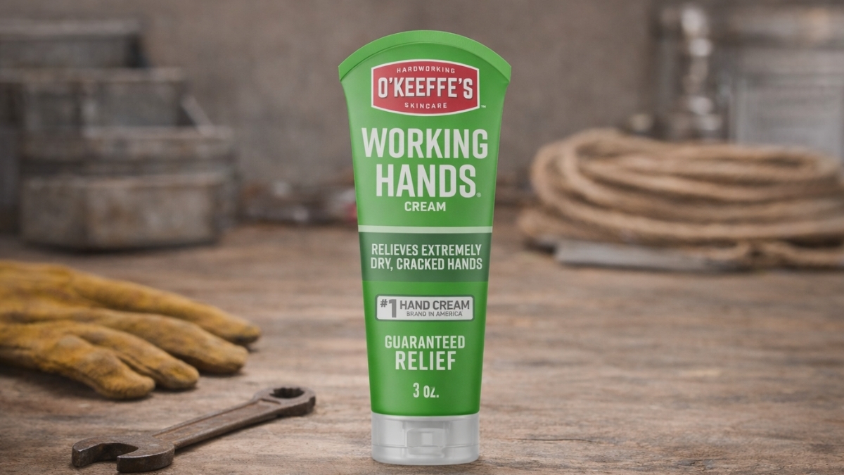 O'Keeffe's Working Hands Cream 3 oz tube on workbench with gloves and tools, hand repair cream for dry cracked hands