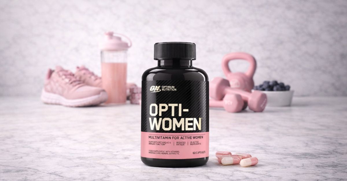 Opti-Women by Body & Fit multivitamin capsules for active women on fitness background
