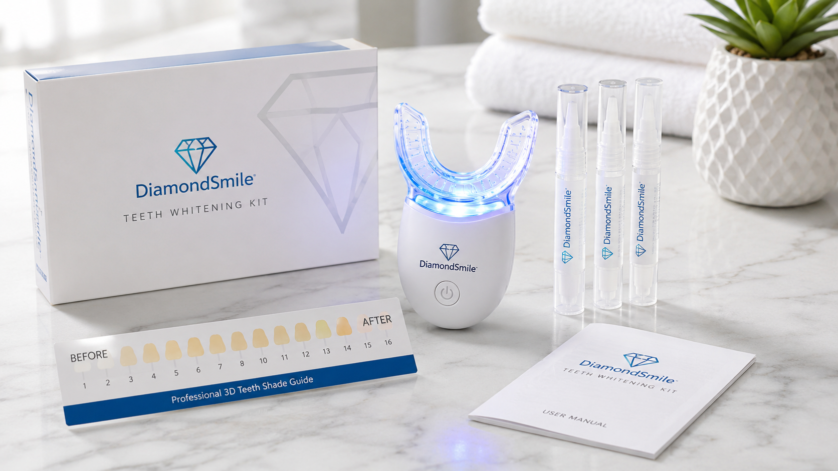 DiamondSmile LED Teeth Whitening Kit with blue LED mouthpiece, whitening gel pens, tooth shade guide, and user manual on a clean bathroom counter.