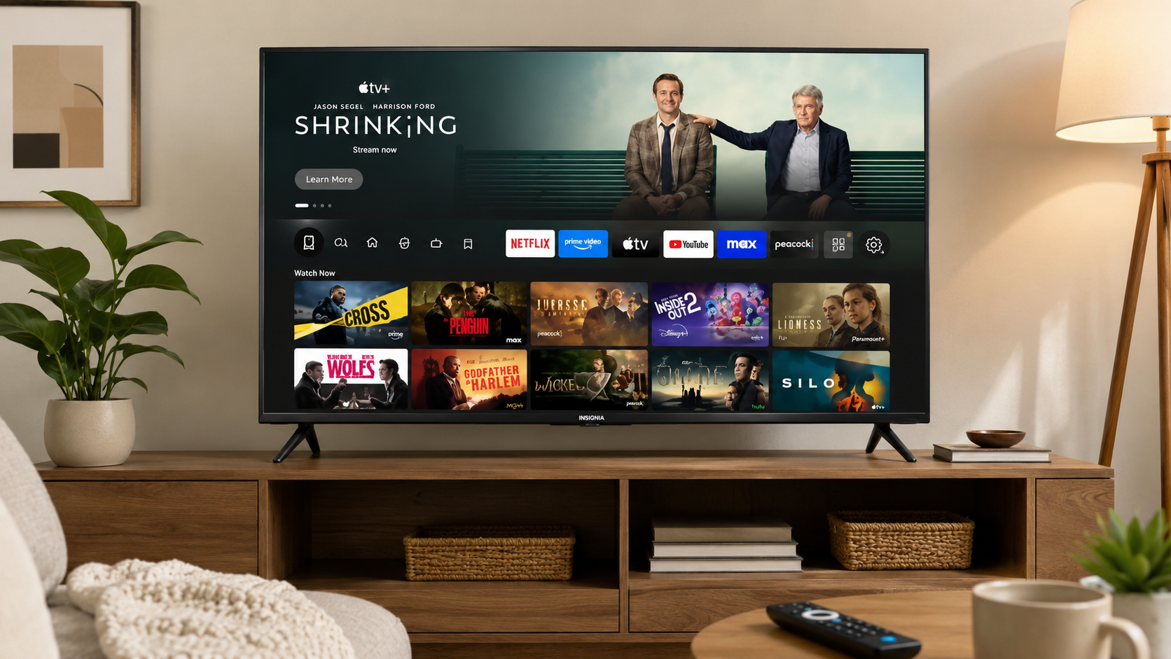 INSIGNIA 40-inch Class FE Series LED Full HD Smart Fire TV displaying streaming apps on screen