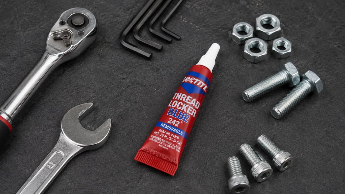 Loctite Blue 242 medium-strength removable threadlocker for automotive repairs, motorcycles, and machinery